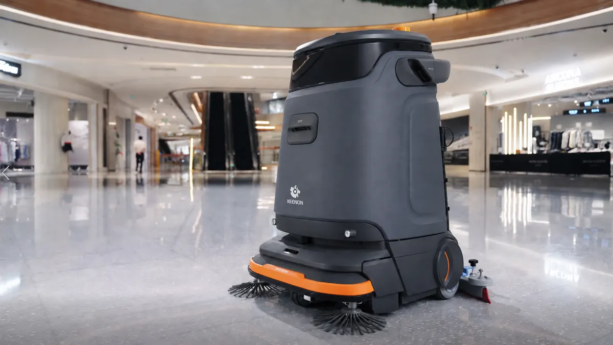 Robot de limpieza Keenon KLEENBOT C55 fregando en un centro comercial